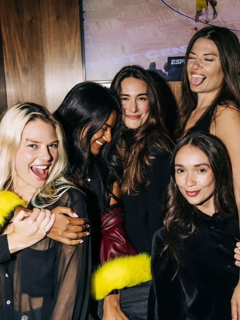 Simone Ashley poses for a photo with her friends 