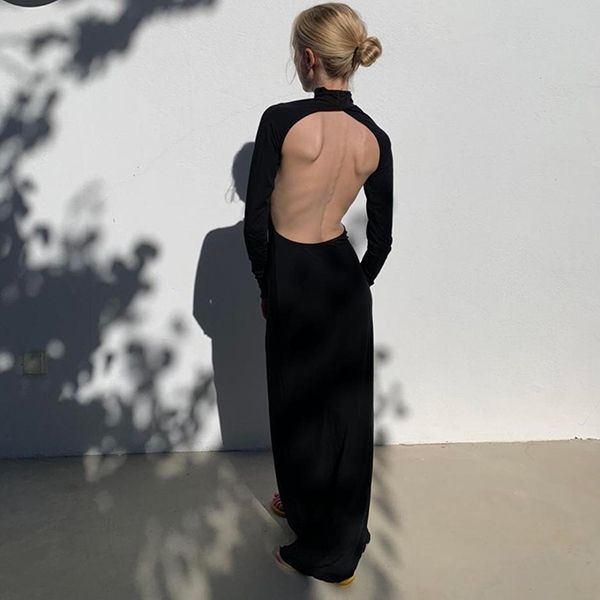 Woman wearing black backless dress