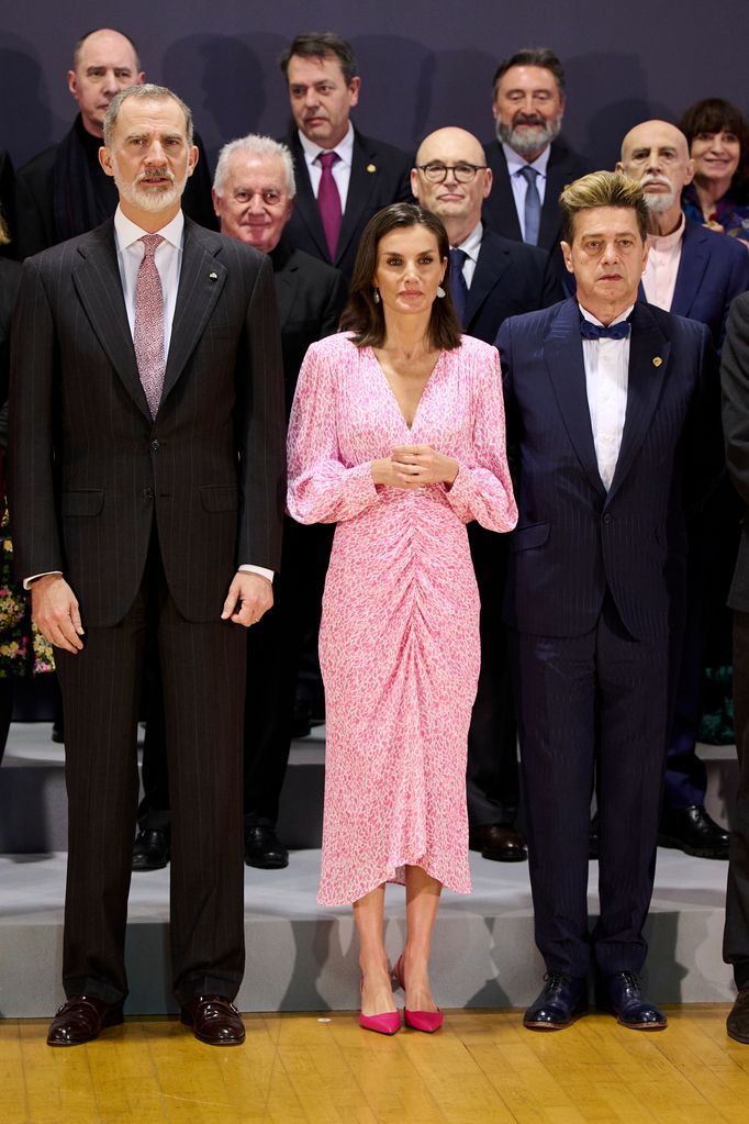 King Felipe VI of Spain, Queen Letizia of Spain and Santiago Auseron stand in line up