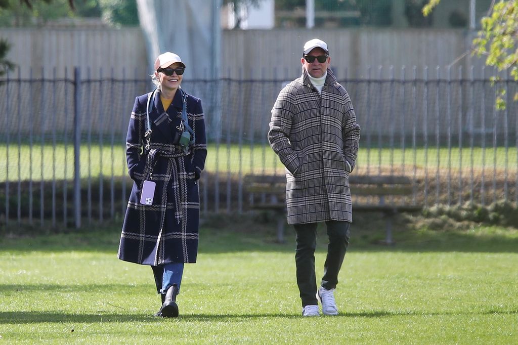 Holly Willoughby and Daniel Baldwin Take Their Dog For A Walk In A Park, London