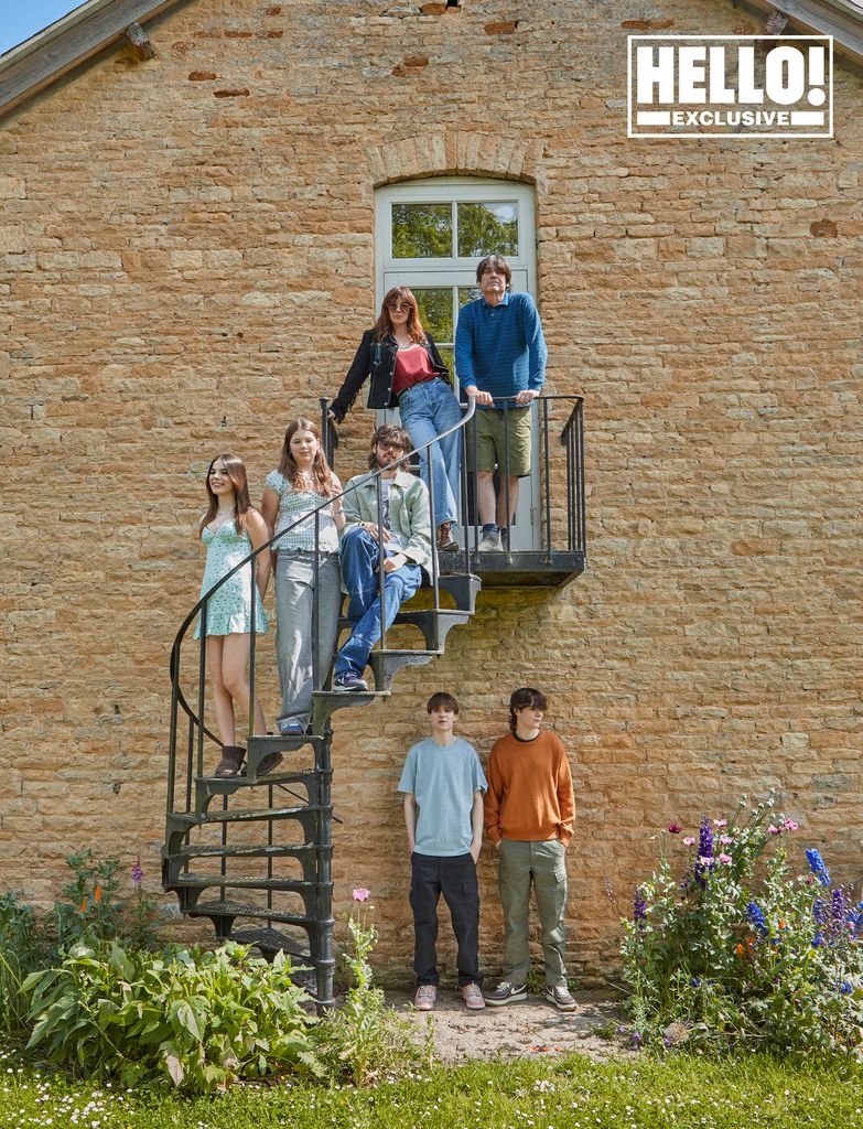 Blur star Alex James's family posing at farmhouse in Kingham, Oxfordshire 