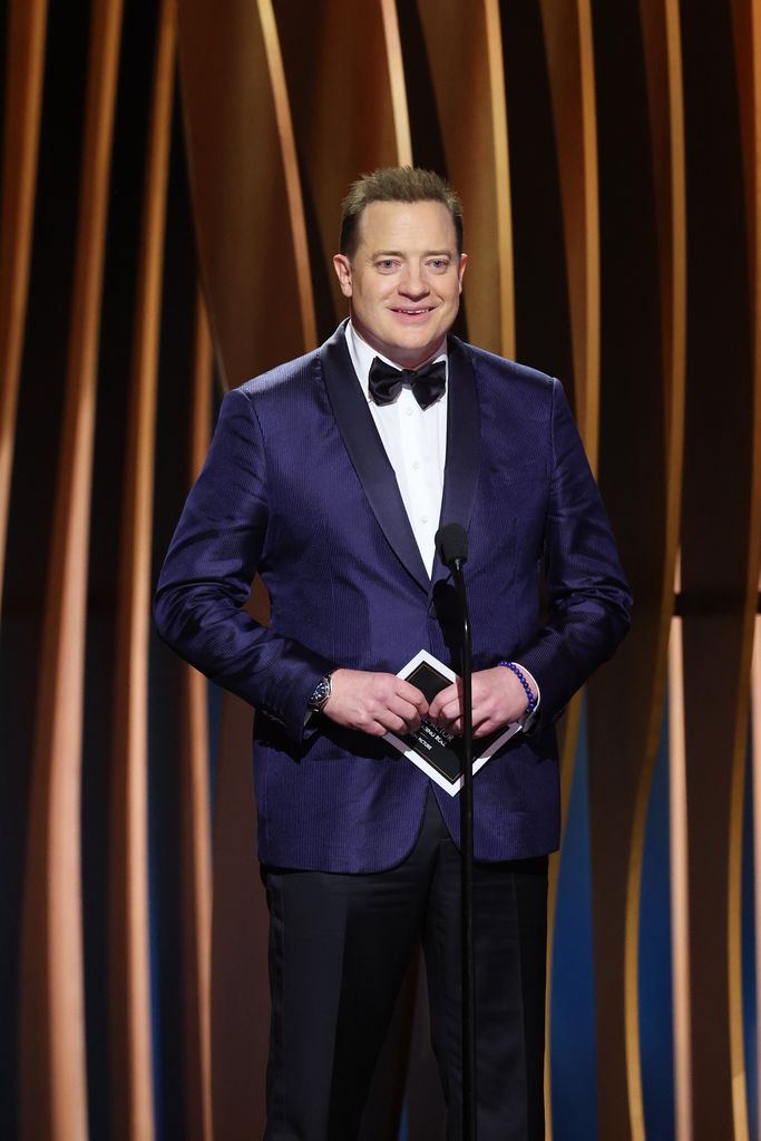 Brendan Fraser in a blue tuxedo