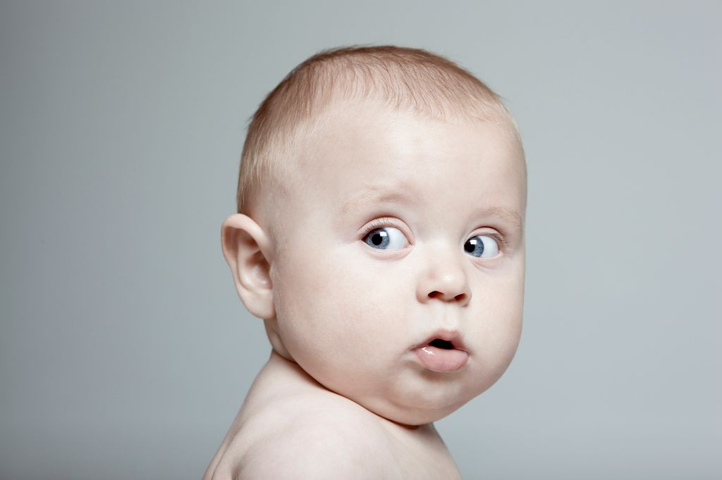 baby with blue eyes and fair hair 
