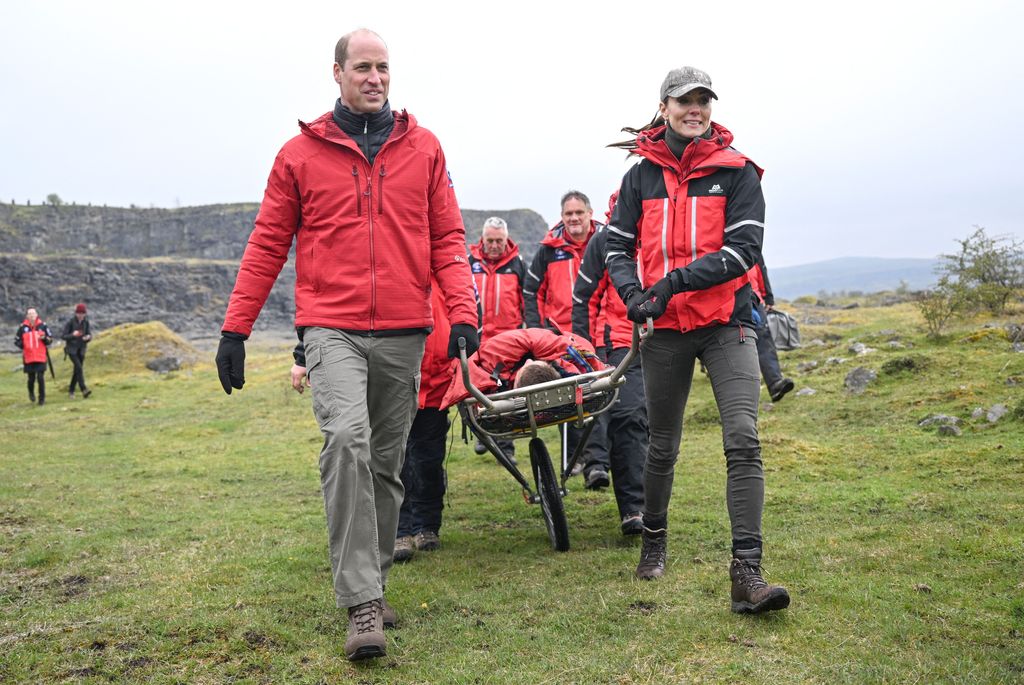 William and Kate rescue a 'casualty' off the mountain during a training exercise