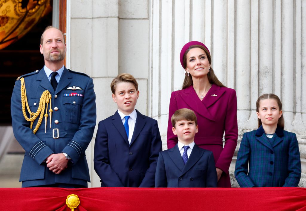 Prince William, Prince George, Prince Louis, Princess Kate and Princess Charlotte watching the planes from the balcony of Buckingham Palace