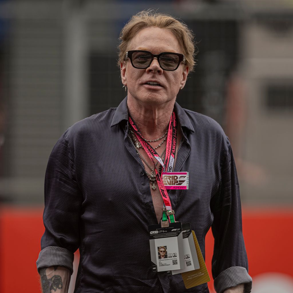 Axl Rose stands on the grid before the race day at the 40th Formula 1 Lenovo Hungarian Grand Prix