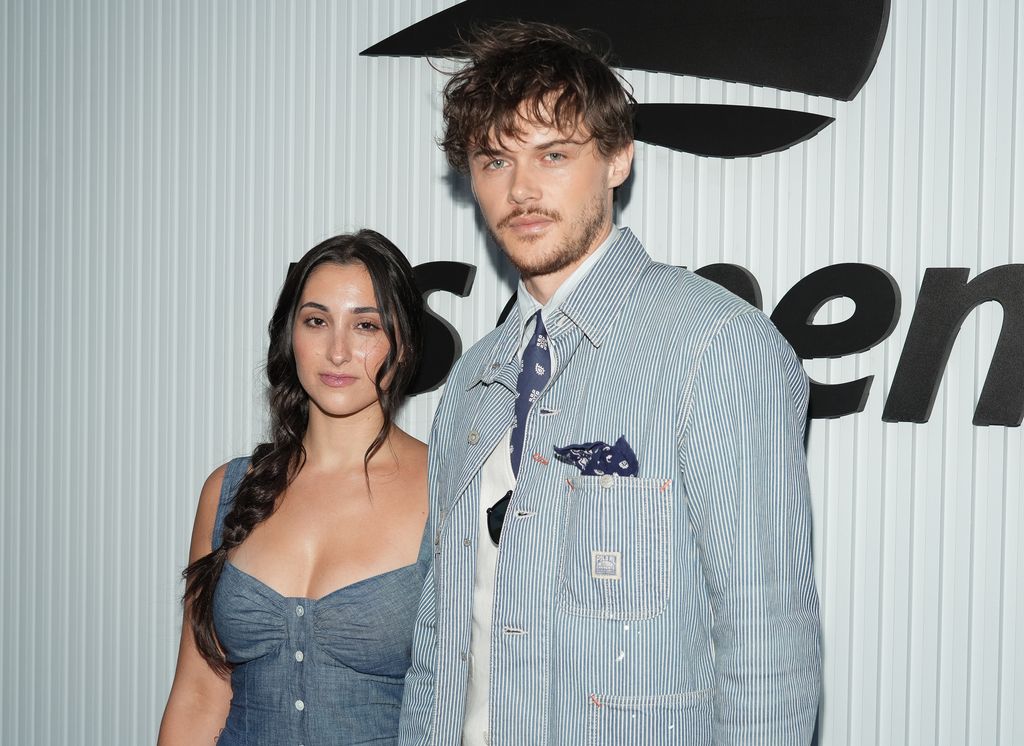 photo of Christopher Briney and Isabel Machado in denim 