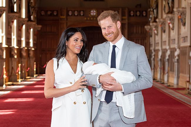 prince harry and meghan markle with royal baby