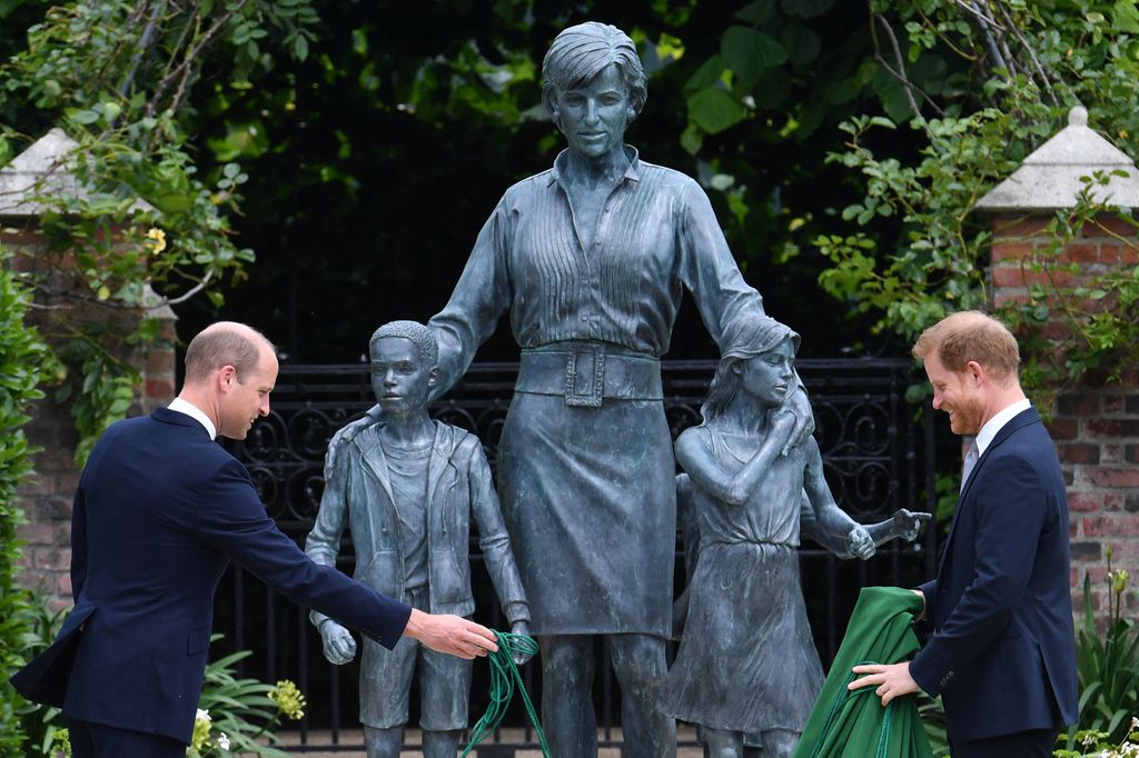 Prince William and Prince Harry unveil a statue of their mother, Princess Diana, at The Sunken Garden in Kensington Palace, London in July 2021