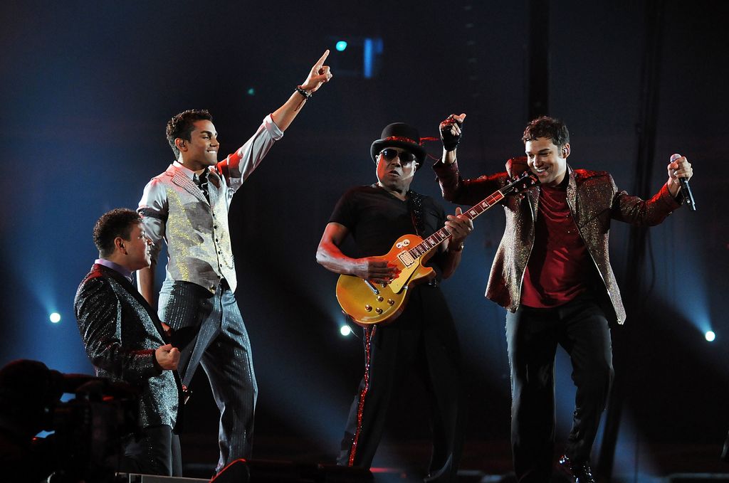 Taj Jackson (L), TJ Jackson (2nd L) and Taryll Jackson (R) of 3T perform with Tito Jackson at the 'Michael Forever Tribute Concert' at Millennium Stadium on October 8, 2011 in Cardiff, Wales. 