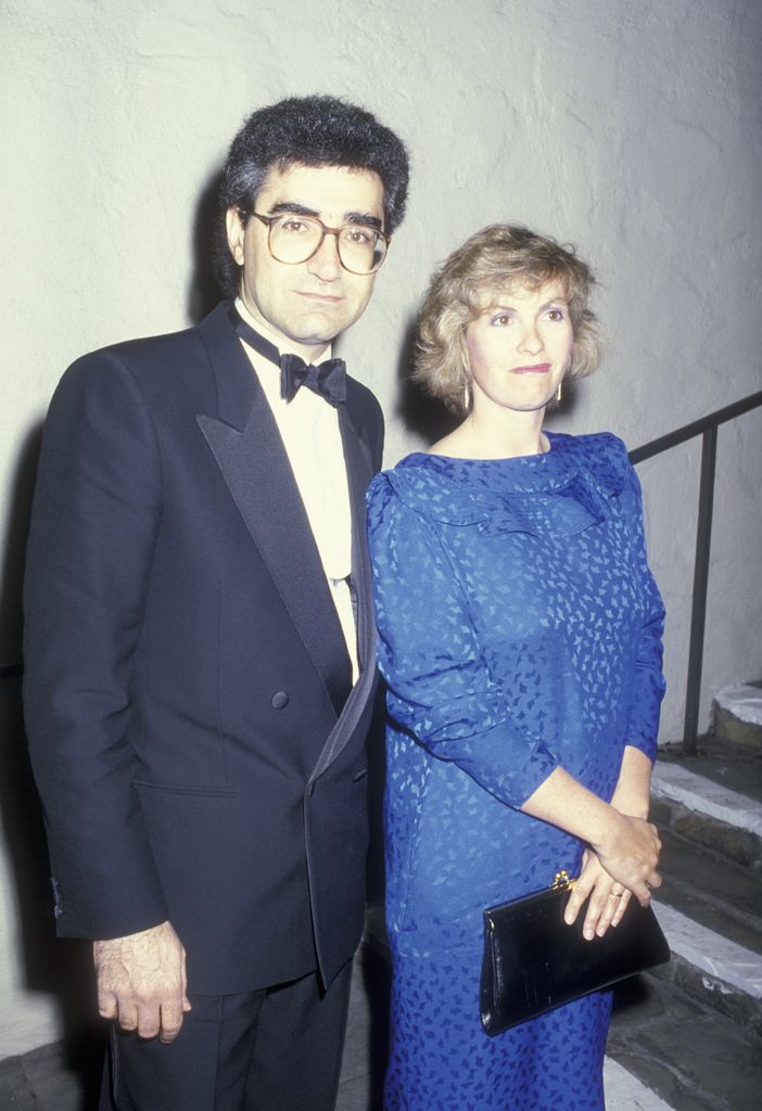 Actor Eugene Levy and wife Deborah Divine attend the premiere of A Fine Mess on April 19, 1986 at the Comedy Store in Hollywood, California.