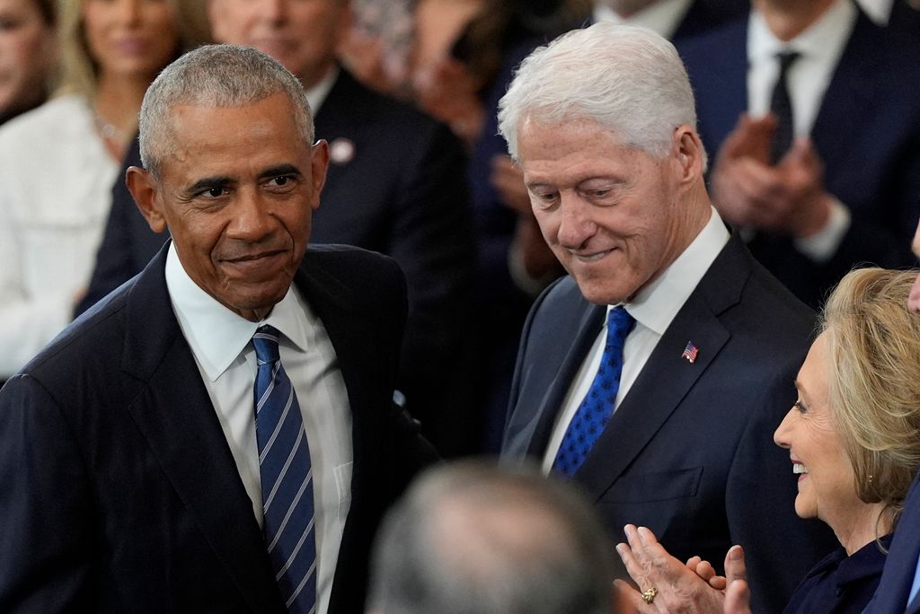 Barack with Bill Clinton - who also received boos from the crowds 