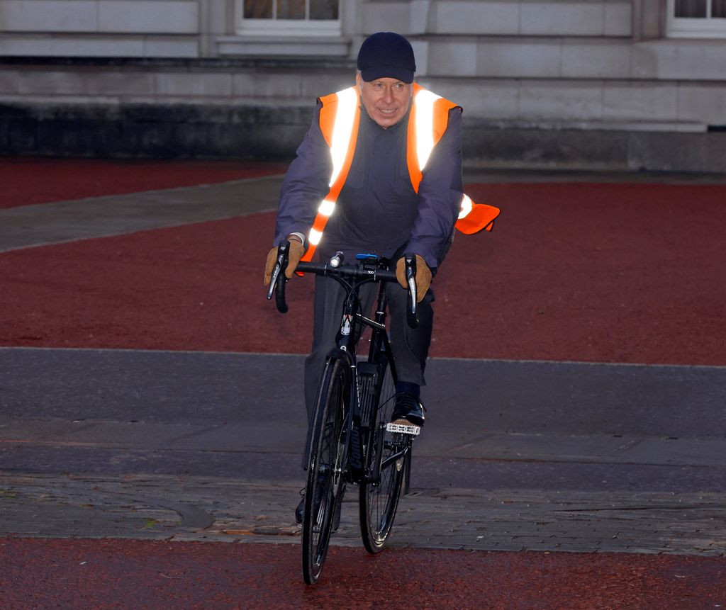 David Armstrong-Jones arrives on his bike to the King's Christmas lunch