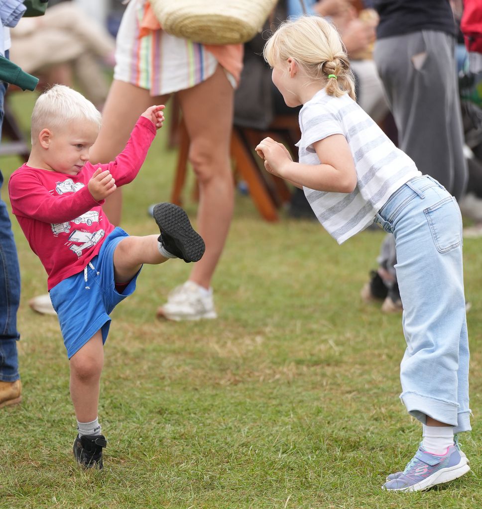 Lucas Tindall is a 'wild' child on day out with dad Mike Tindall to ...