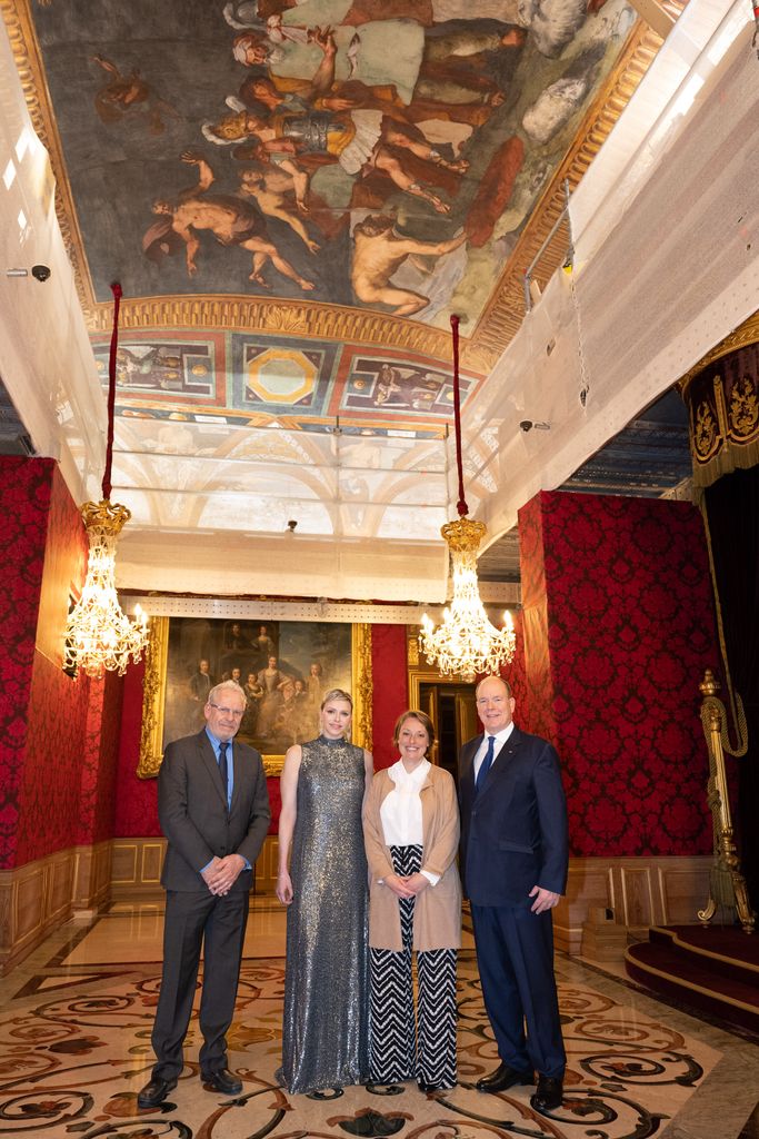 The project’s director, Christian Gautier, with Charlene, Julia and Albert in the Throne Room, where restoration work has revived the brightness of the Nekyia on its ceiling
