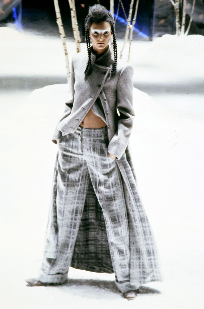 Model Sunniva Stordal Bjorklund walks in the Alexander McQueen Fall 1999 Ready to Wear Runway Show on February 23, 1999, in London, England. The show titled "The Overlook" was inspired by Stanley Kubrick's film "The Shining" and took place entirely inside of a lucite box. (Photo by Giovanni Giannoni/WWD/Penske Media via Getty Images)