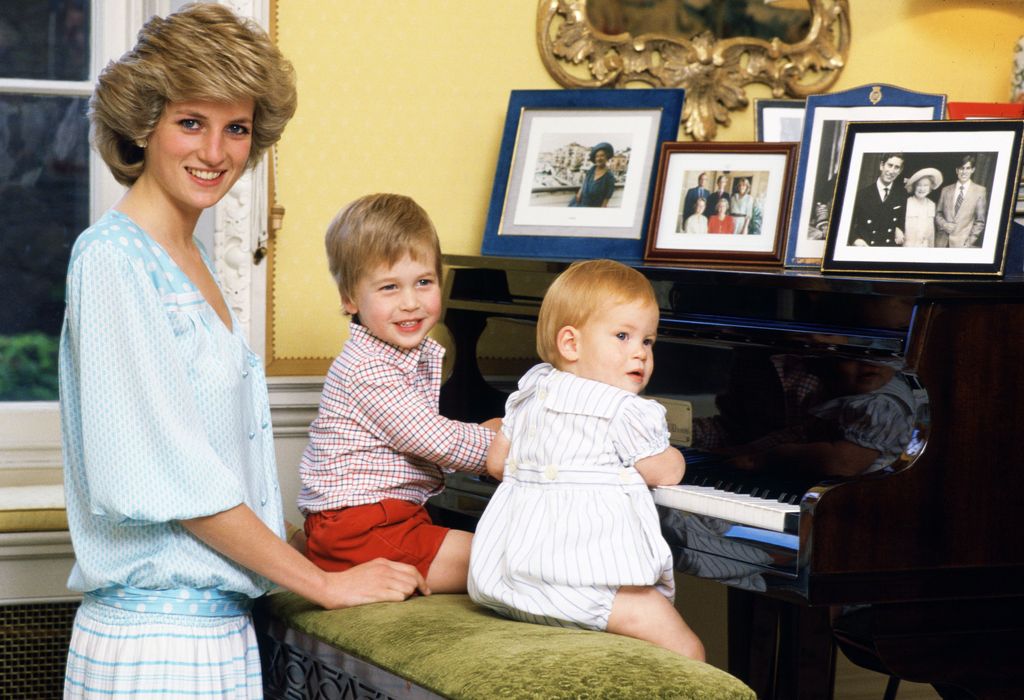 Princess Diana with young Prince William and Prince Harry at a piano
