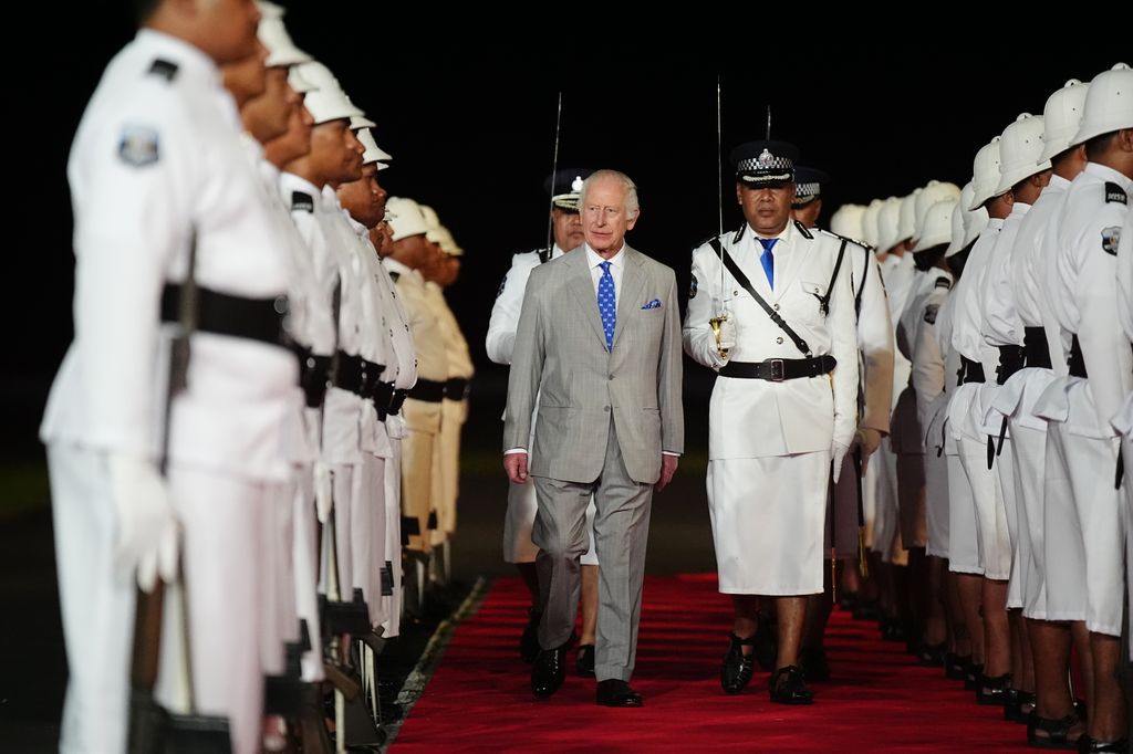 King Charles greeted by a guard of honour formed by the Samoa Police Service