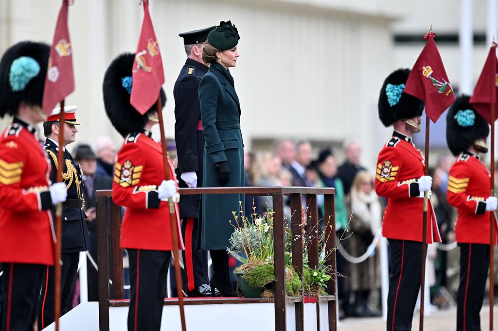 Kate watched the parade from the podium