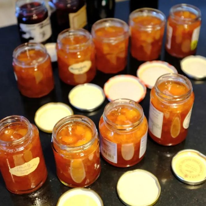 Table of jam jars lined up