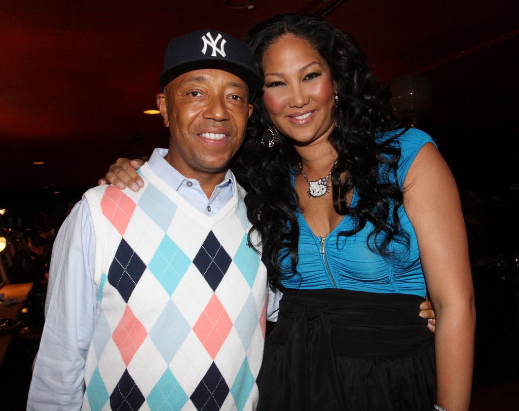 Russell Simmons and Kimora Lee Simmons attend the Baby Phat & KLS Collection Spring 2010 during Mercedes-Benz Fashion Week at Roseland Ballroom on September 15, 2009 in New York City