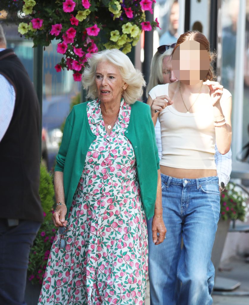 Queen Camilla in floral dress shopping with Eliza Lopes in Ballater