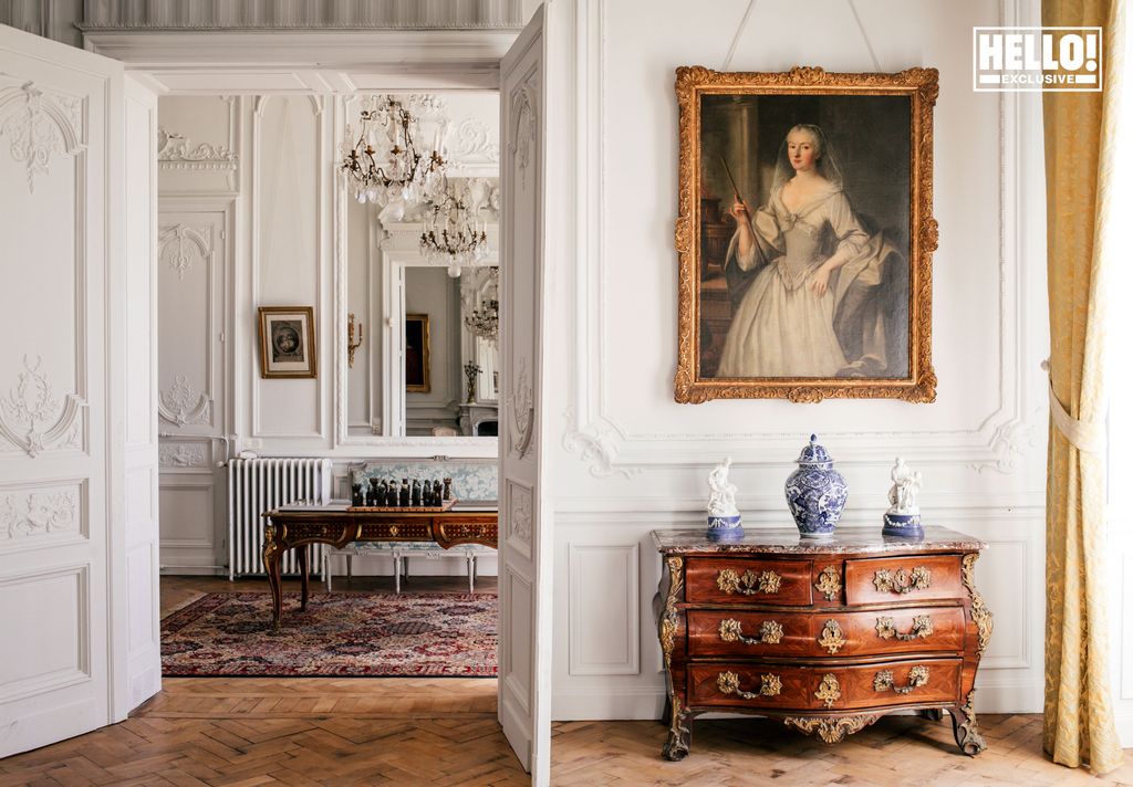 Baron Arnaud De Bastard's artwork and hallway at Chateau de Saint-Denis