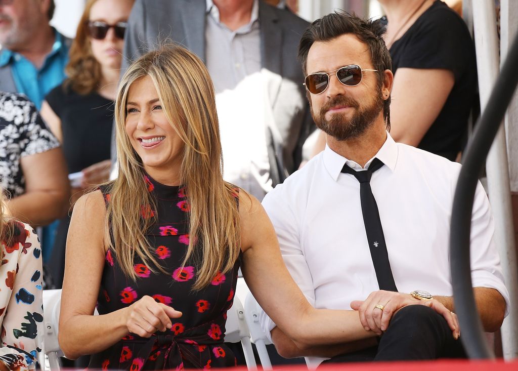 Jennifer Aniston and Justin Theroux in matching black at Louis