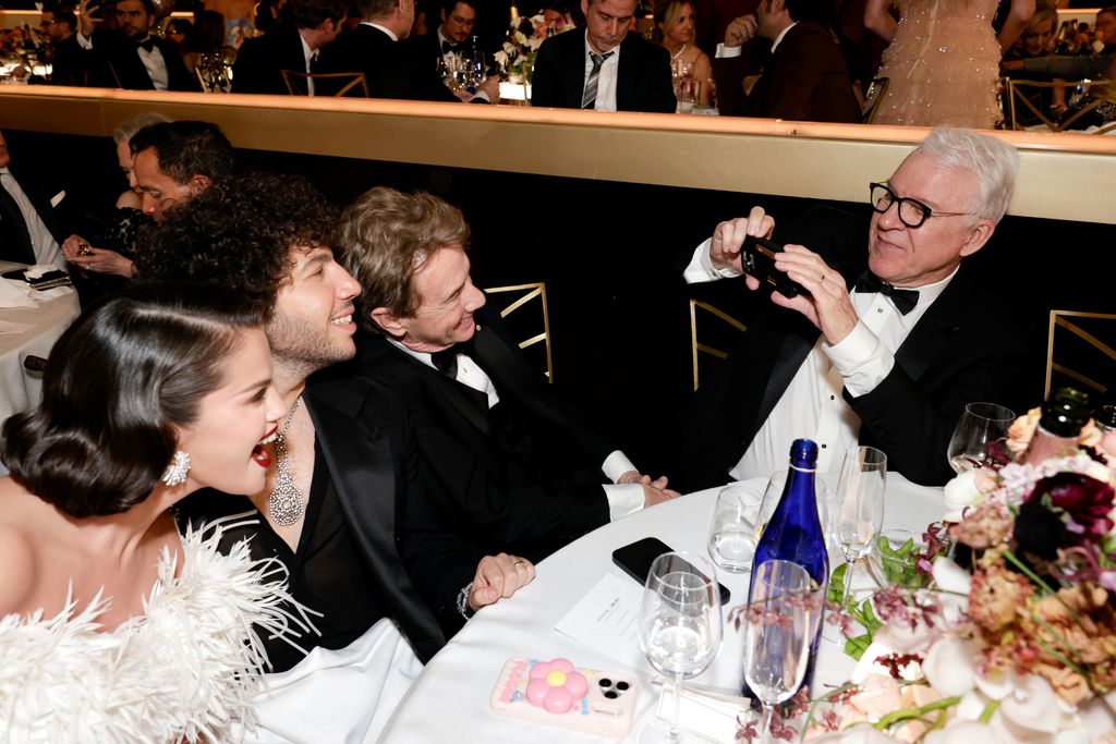 Selena Gomez, Benny Blanco, Martin Short and Steve Martin attend the 83rd Annual Golden Globe Awards at The Beverly Hilton on January 11, 2026 in Beverly Hills, California. (Photo by Francis Specker/CBS via Getty Images)