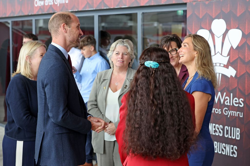 Prince William meets with former players during a visit to Parc y Scarlets, the home of the Scarlets Rugby Union team