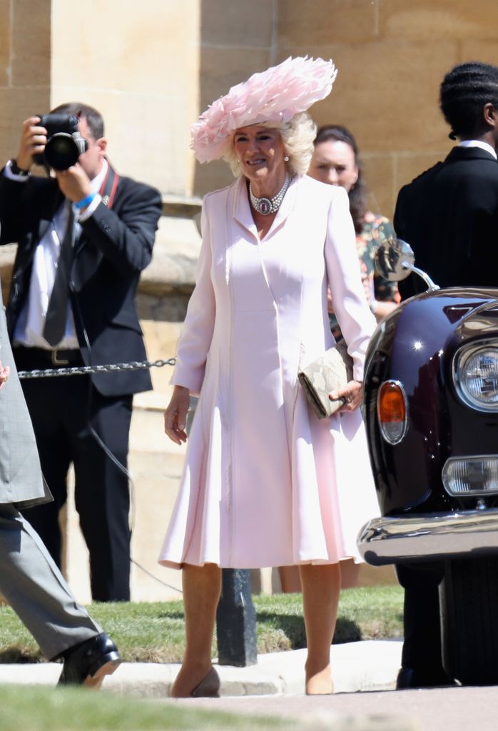 woman wearing pink coat dress at royal wedding 