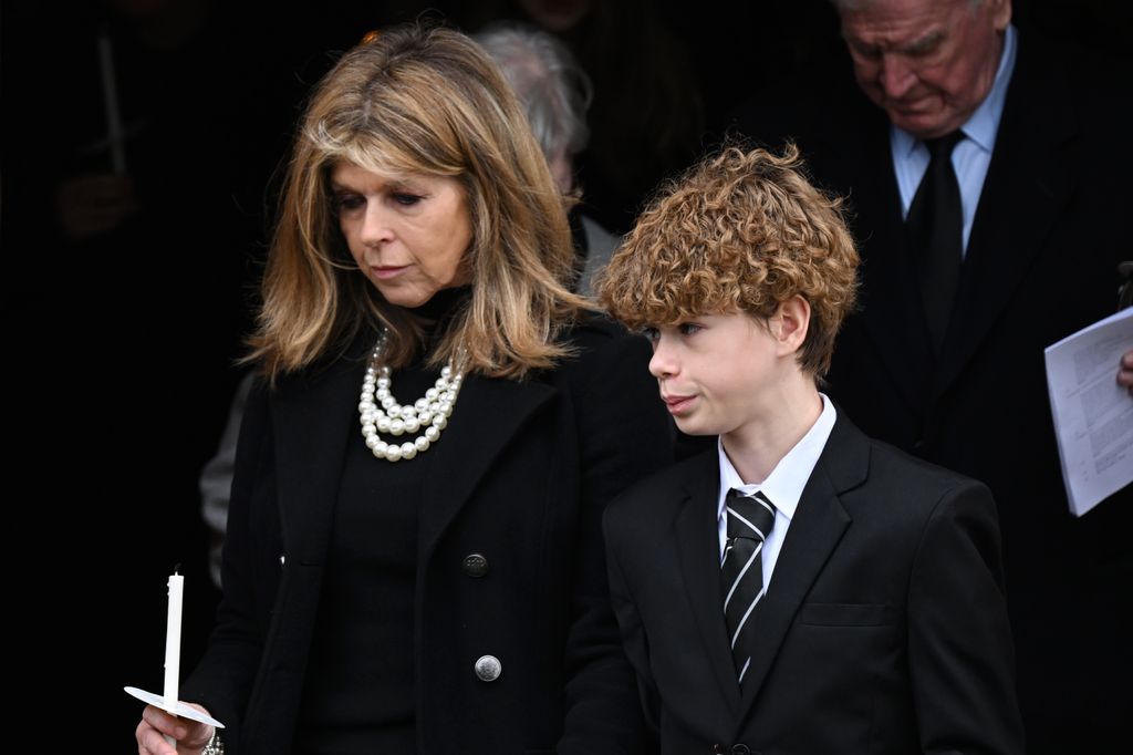 Kate Garraway and son Billy Draper depart the funeral of Derek