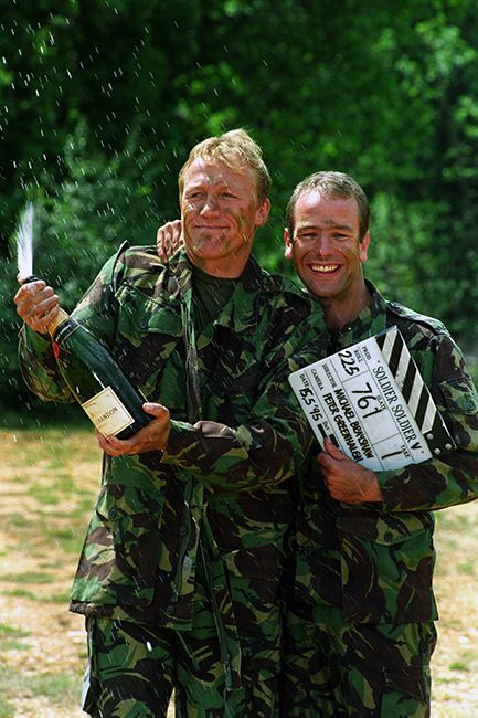 Jerome and Robson celebrate their no1 single with champagne