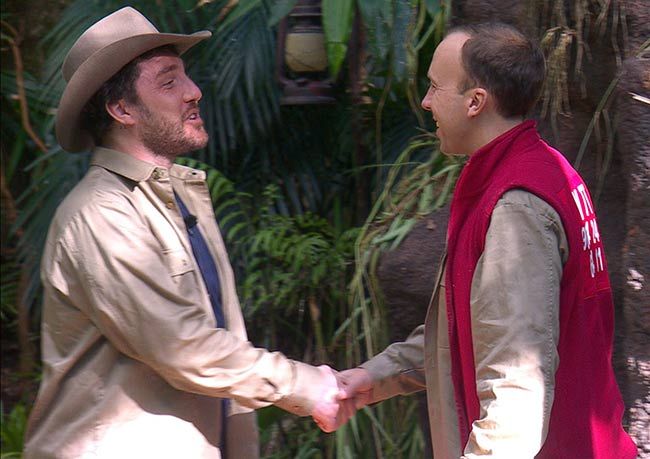Seann Walsh and Matt Hancock shaking hands after meeting in the jungle