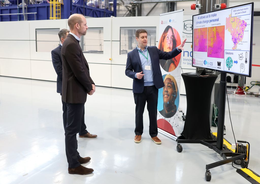 Prince William in front of a supercomputer