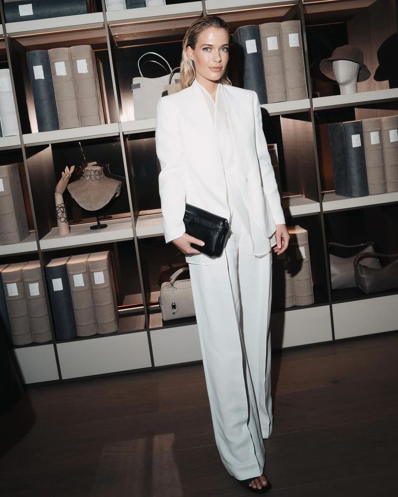 She wore a contemporary three-piece white suit