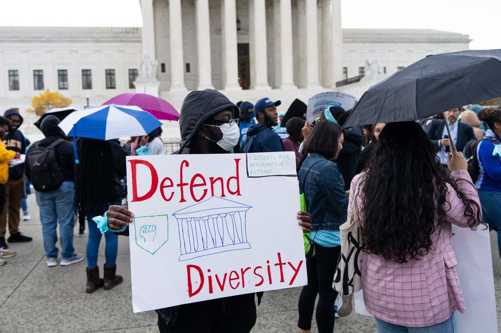 Protesters gather in front of the U.S. Supreme Court as affirmative action cases involving Harvard and University of North Carolina admissions are heard by the court in Washington on Monday, October 31, 2022
