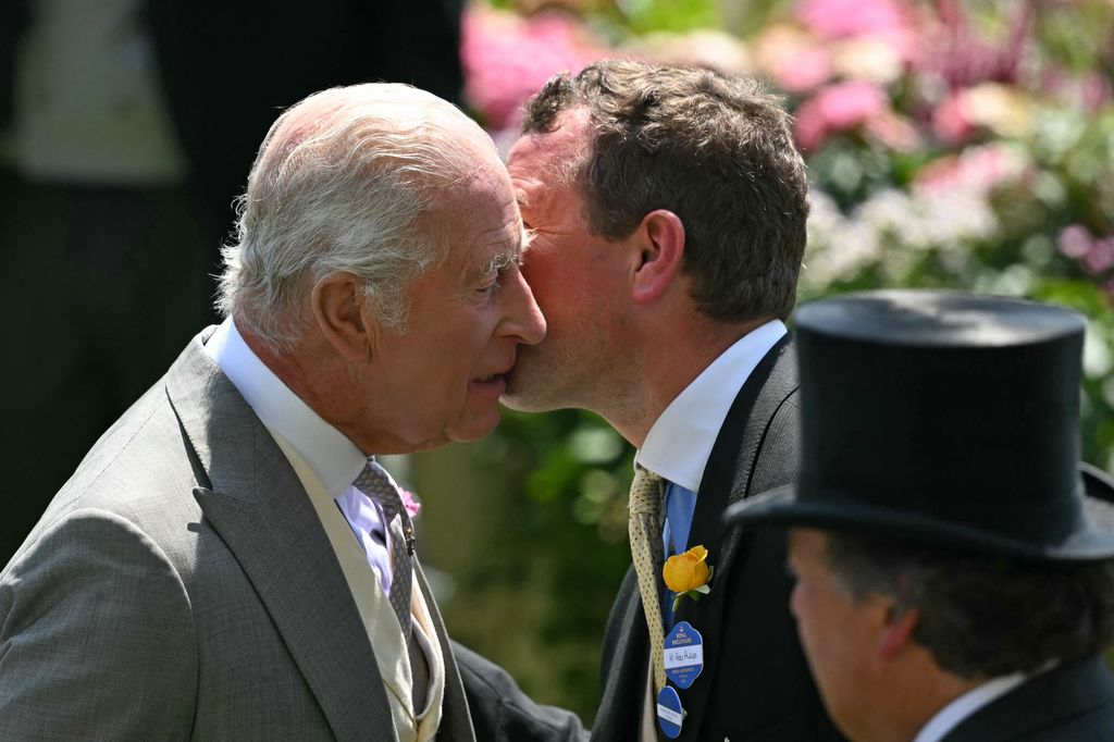 Peter Phillips kissing Charles