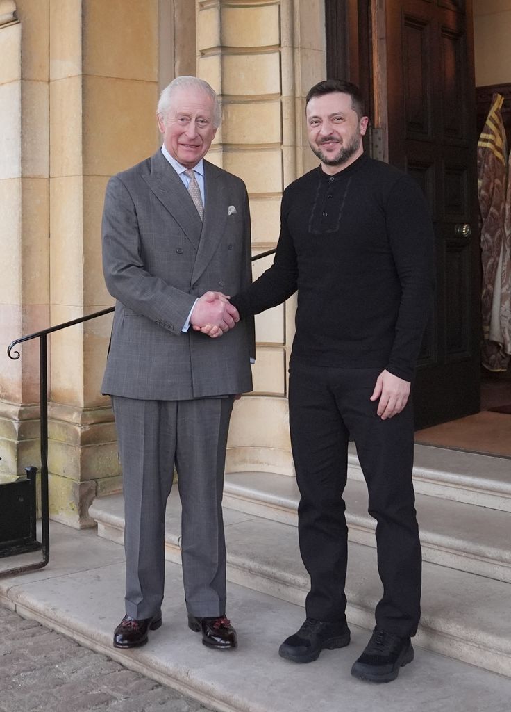 King Charles shaking hands with President Zelenskyy