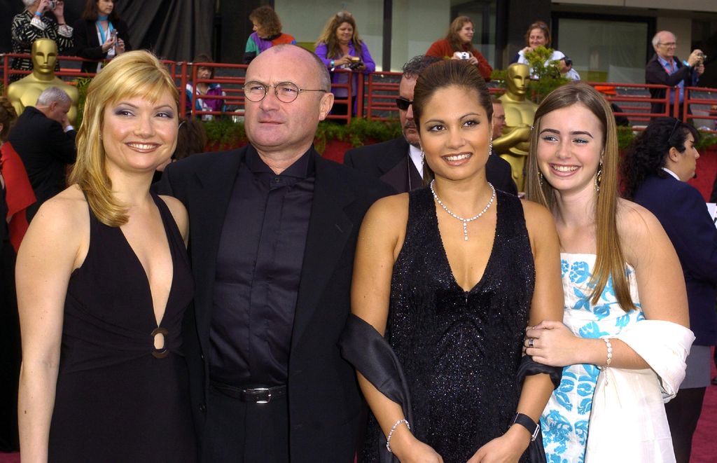 Phil Collins (2nd from left), daughter Joely, wife Orianne and daughter Hilary at the The 76th Annual Academy Awards in 2003