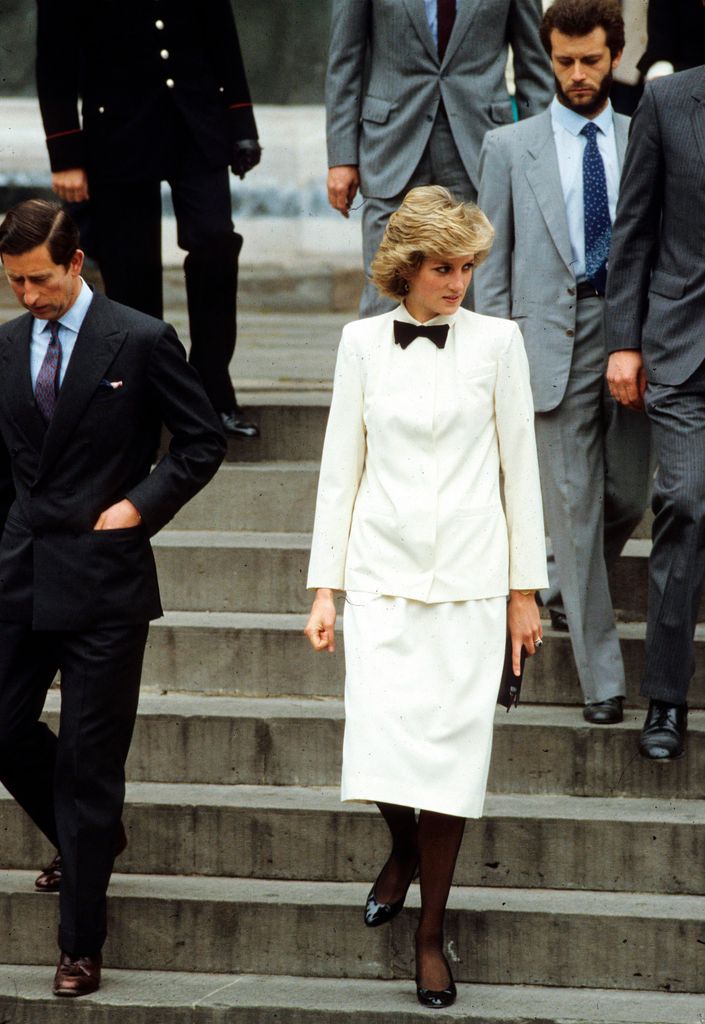 FLORENCE,ITALY - APRIL 24: Prince Charles, Prince of Wales and Diana, Princess of Wales, wearing a white tuxedo suit with a bow tie designed by Jasper Conran, visit Florence on April 24, 1985 in Florence, Italy. (Photo by Anwar Hussein/Getty Images)