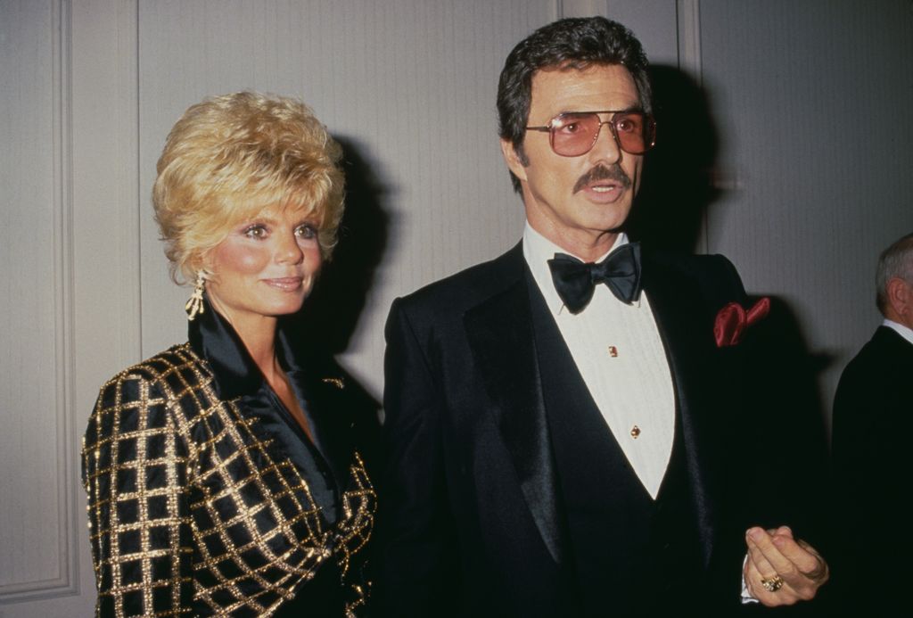 American actress Loni Anderson and American actor Burt Reynolds (1936-2018) attend the Friars Club of California's gala in 1987