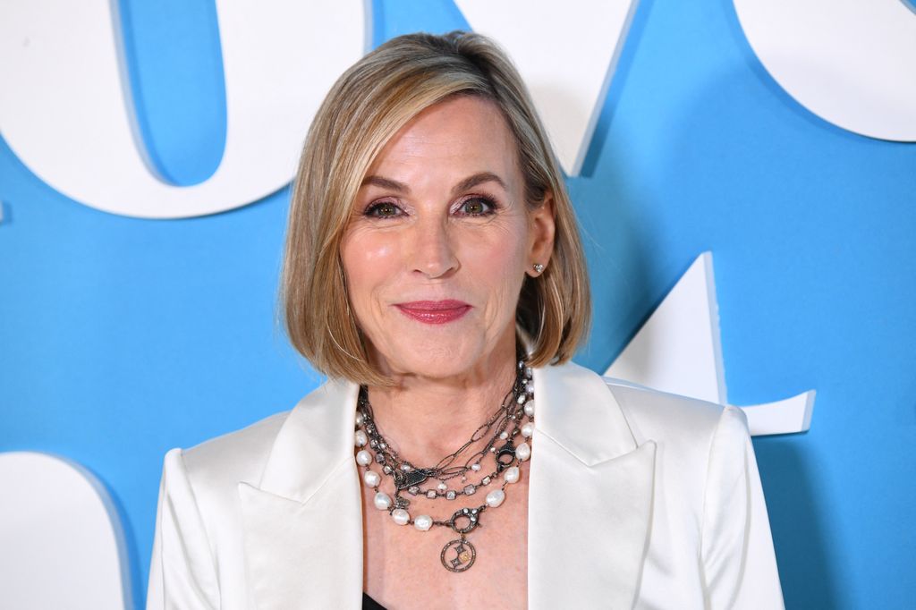 bess armstrong white suit