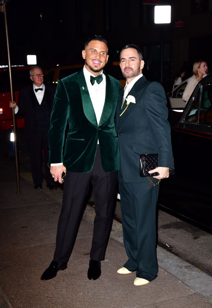 The grooms  in green suits 