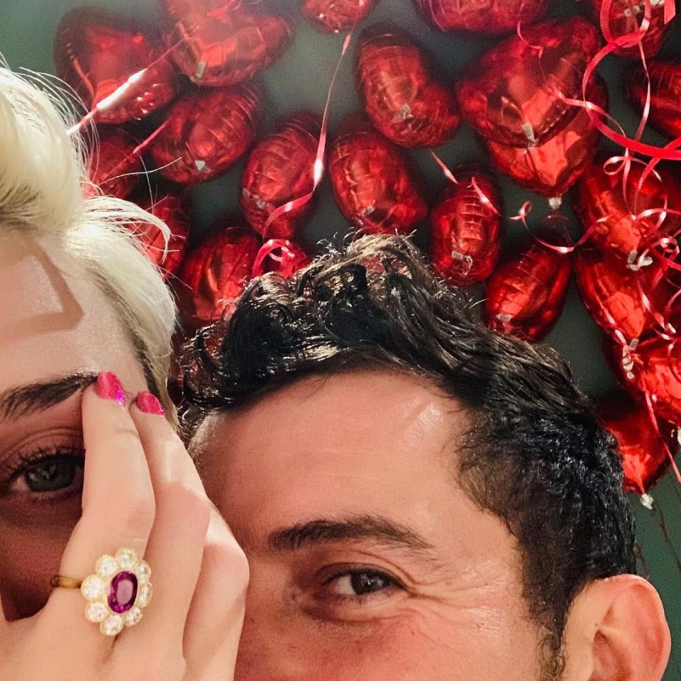 Katy perry and orlando bloom corner of face with ring in view