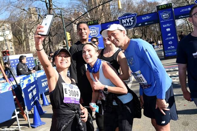 TJ Holmes, Andrew Shue, and Amy Robach running a New York City. half marathon