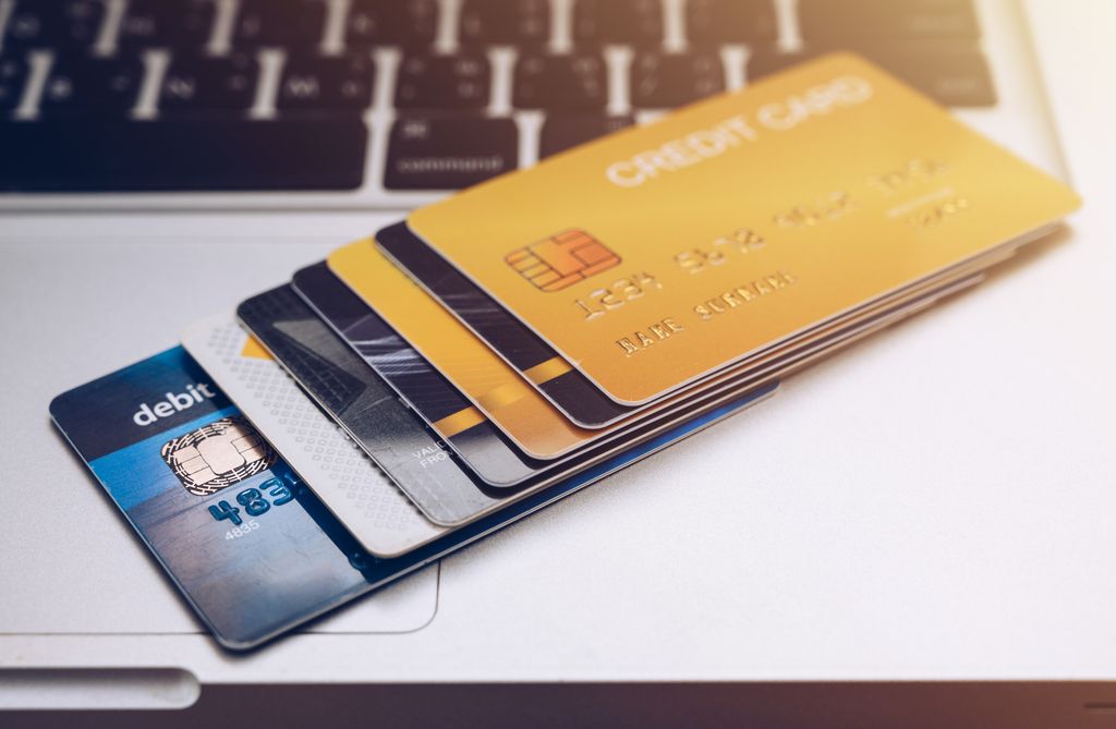 Group of Debit card and Credit card on laptop