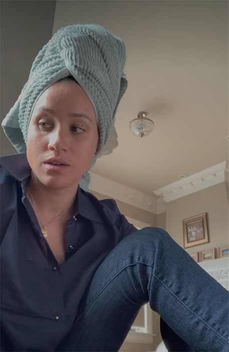 Meghan Markle makeupfree with a towel around her hair