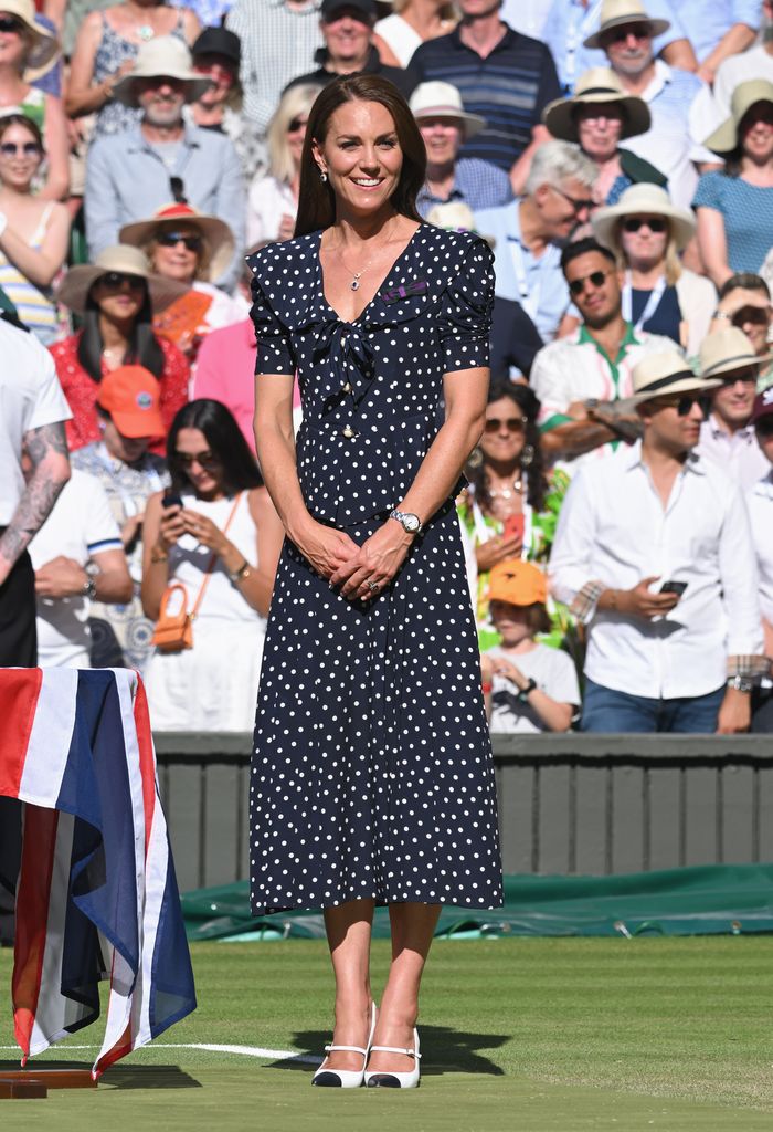 Princess Kate loves a dark polka dot dress, pictured here at Wimbledon in 2022