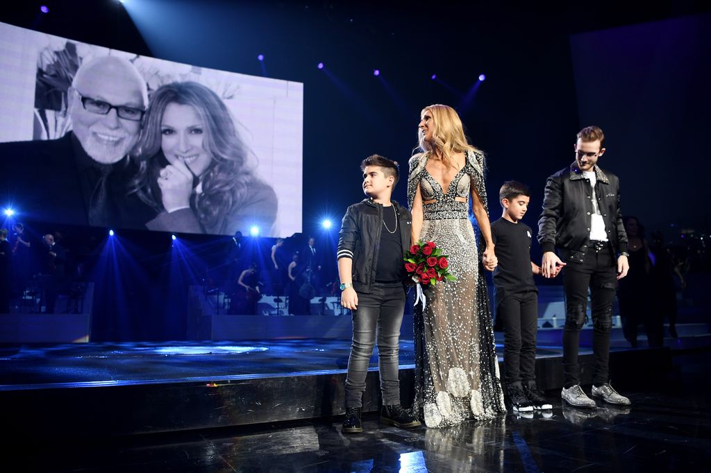 Celine Dion onstage with her three children